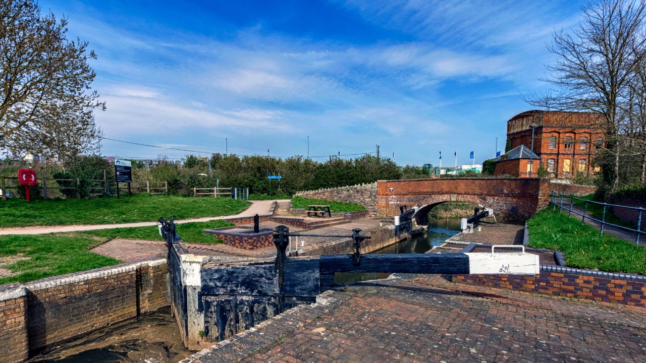 A chef frying food in a wok