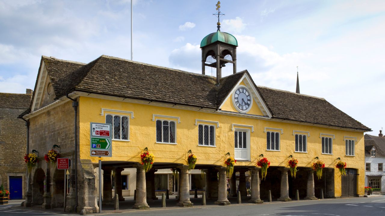 A chef frying food in a wok